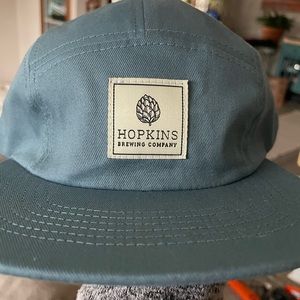 Flat brim, 5 panel hat in light blue. Unisex